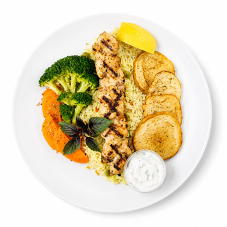 Takeout entrée plate from Gina's Grill and Takeout